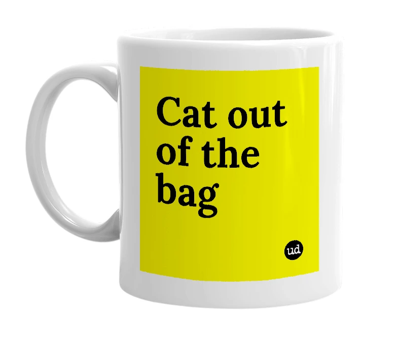 White mug with 'Cat out of the bag' in bold black letters