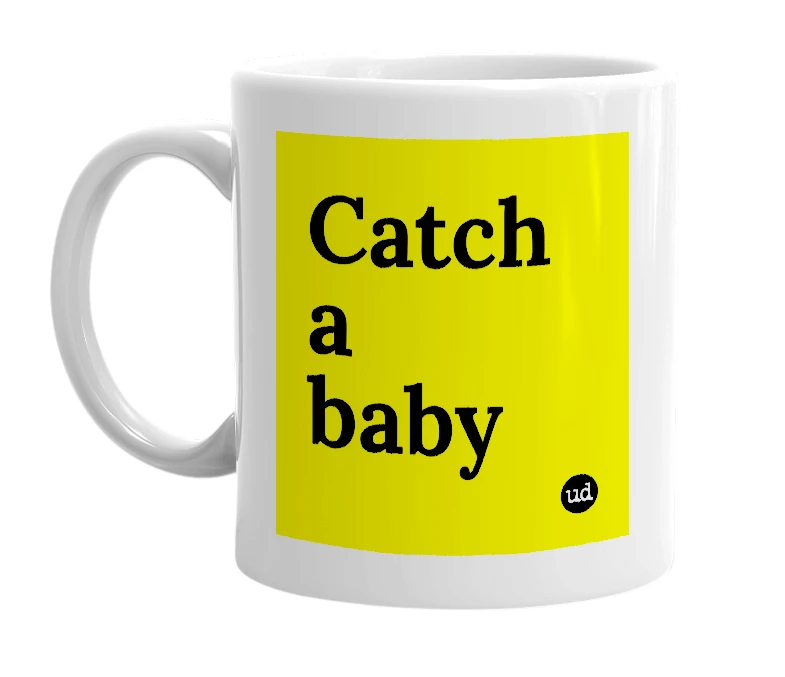 White mug with 'Catch a baby' in bold black letters