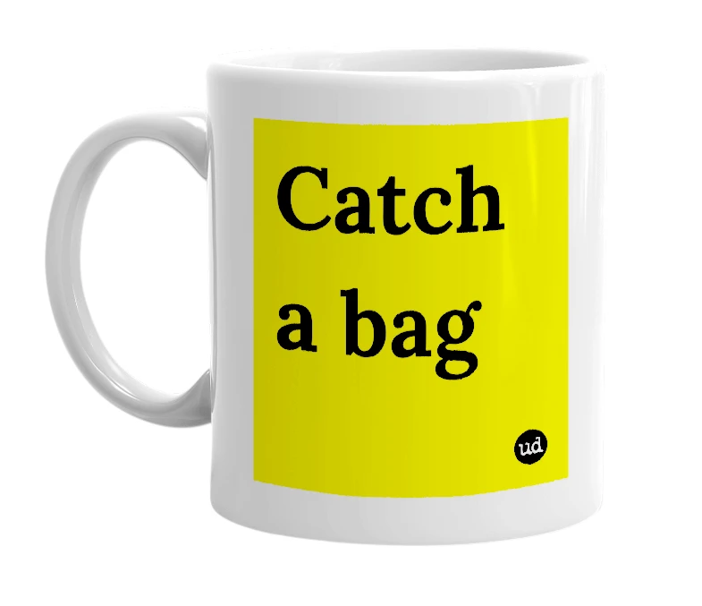 White mug with 'Catch a bag' in bold black letters