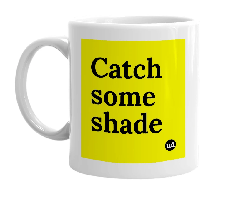 White mug with 'Catch some shade' in bold black letters