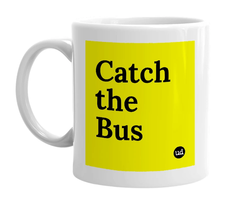 White mug with 'Catch the Bus' in bold black letters