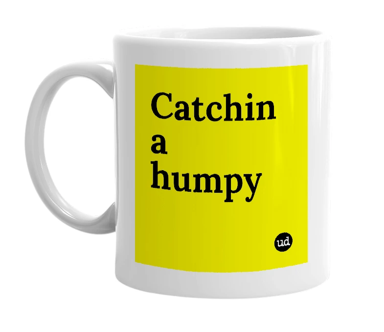 White mug with 'Catchin a humpy' in bold black letters