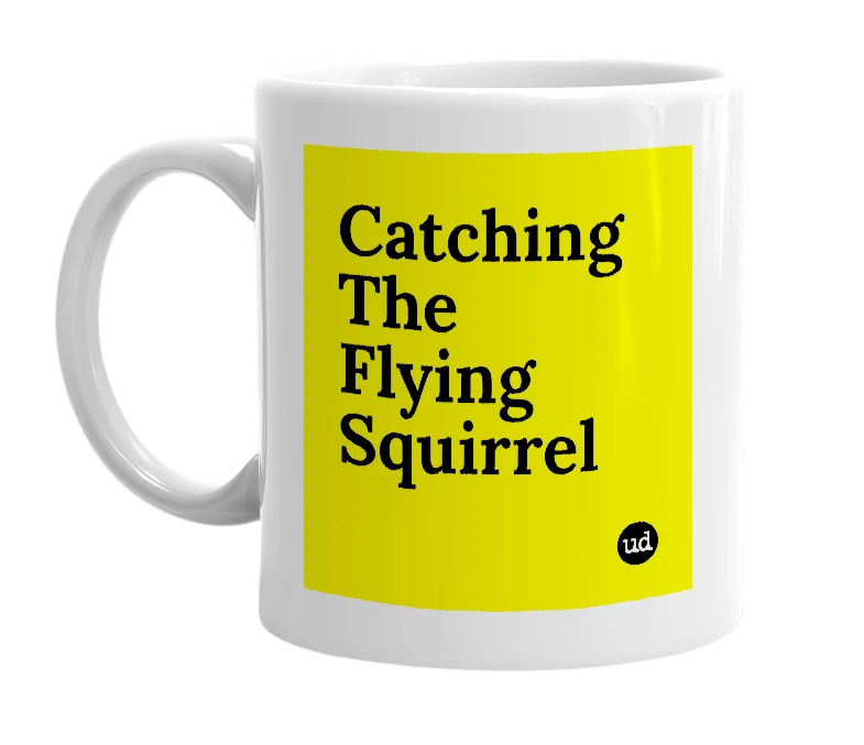 White mug with 'Catching The Flying Squirrel' in bold black letters