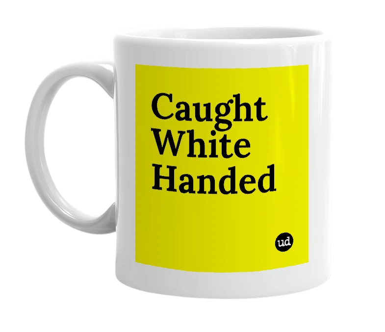 White mug with 'Caught White Handed' in bold black letters