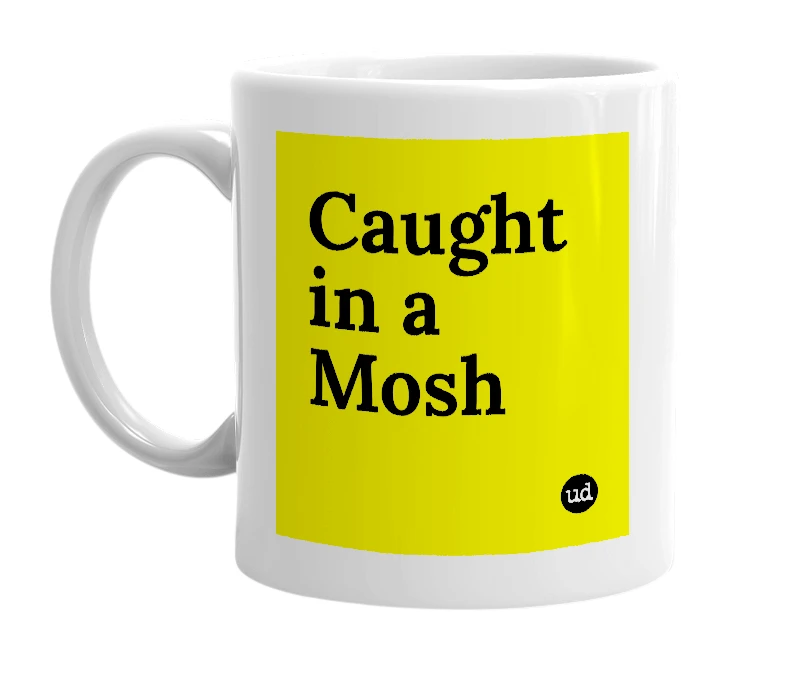 White mug with 'Caught in a Mosh' in bold black letters