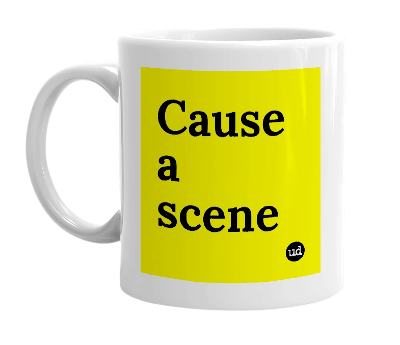 White mug with 'Cause a scene' in bold black letters