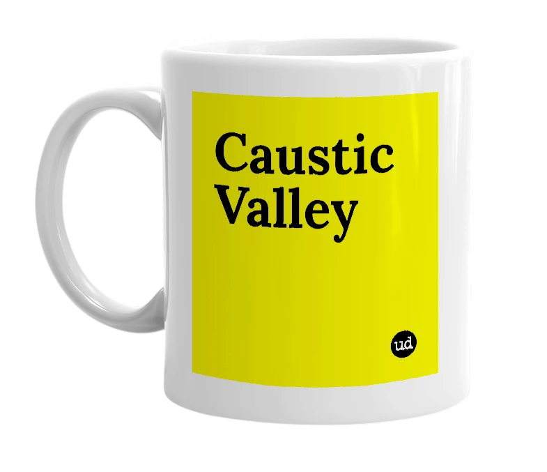 White mug with 'Caustic Valley' in bold black letters