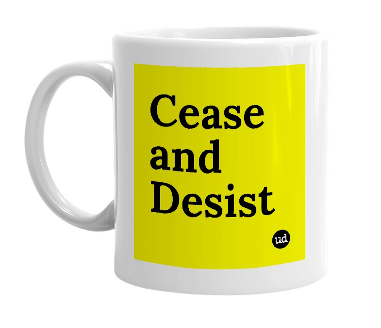 White mug with 'Cease and Desist' in bold black letters