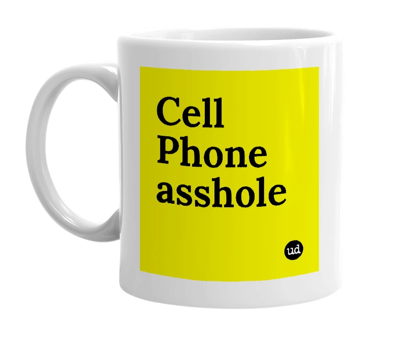 White mug with 'Cell Phone asshole' in bold black letters