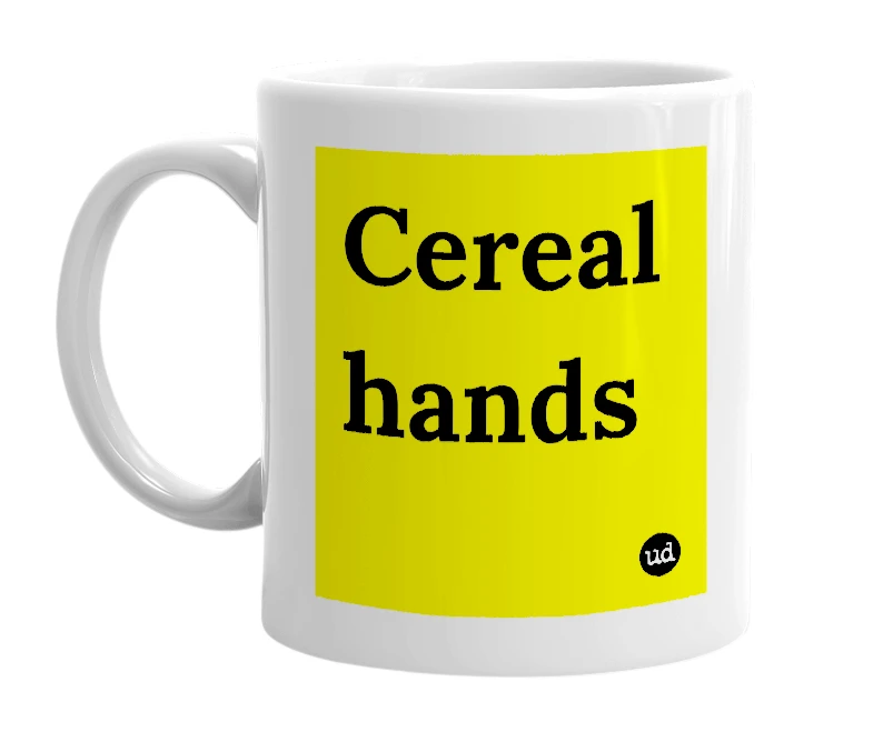 White mug with 'Cereal hands' in bold black letters
