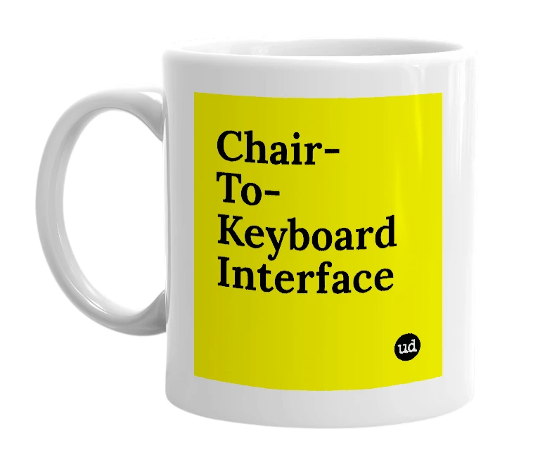 White mug with 'Chair-To-Keyboard Interface' in bold black letters