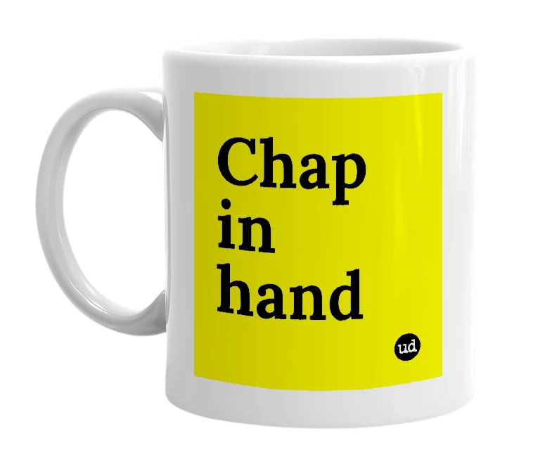 White mug with 'Chap in hand' in bold black letters