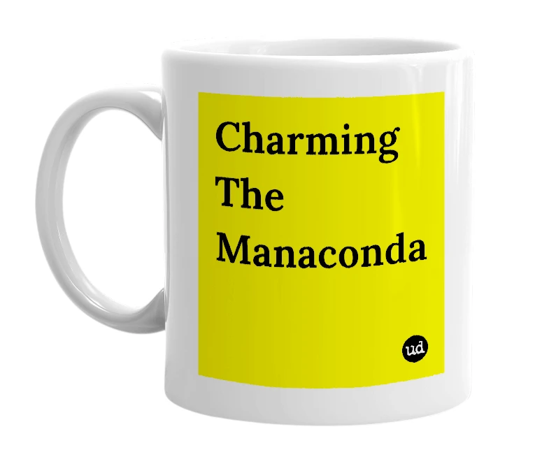 White mug with 'Charming The Manaconda' in bold black letters