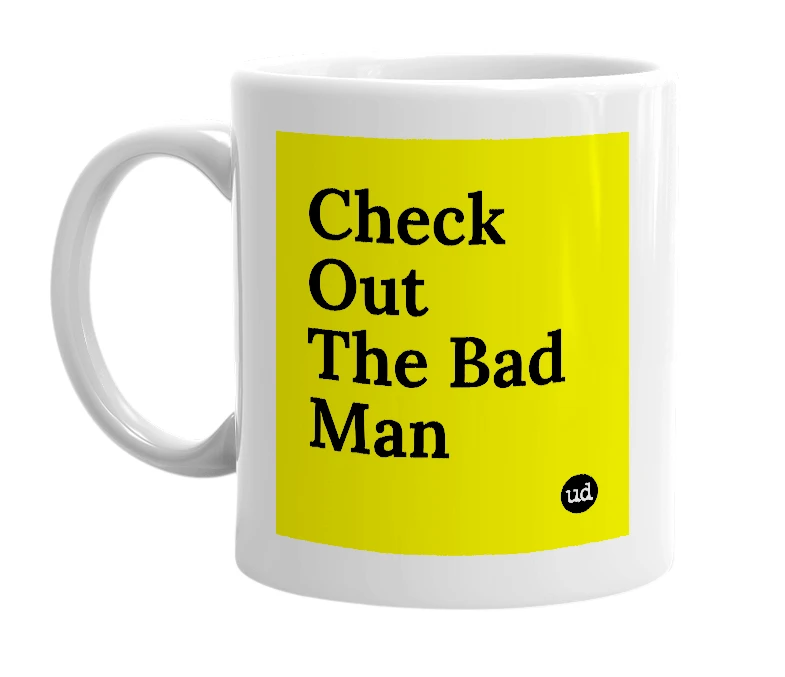 White mug with 'Check Out The Bad Man' in bold black letters