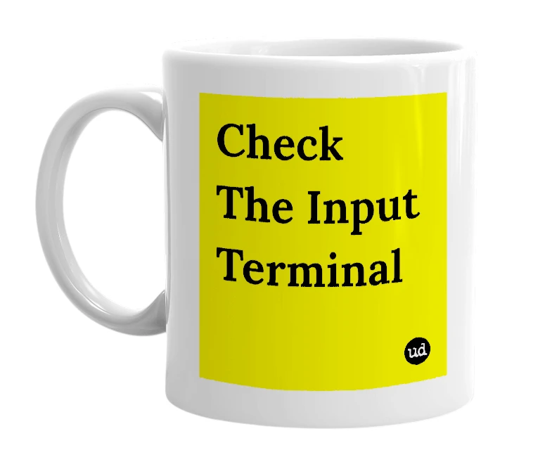 White mug with 'Check The Input Terminal' in bold black letters