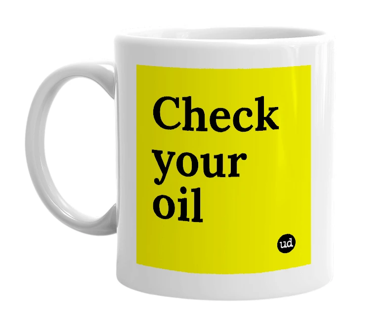 White mug with 'Check your oil' in bold black letters