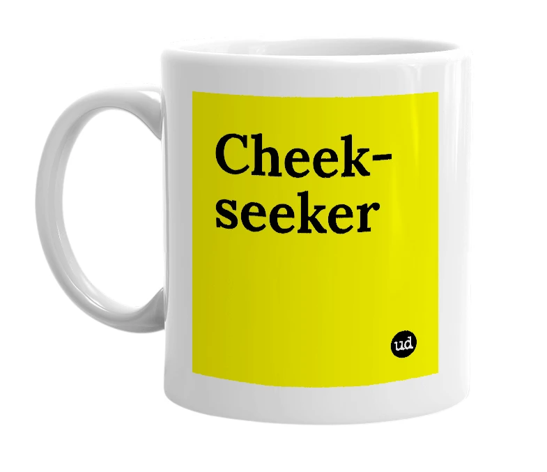 White mug with 'Cheek-seeker' in bold black letters