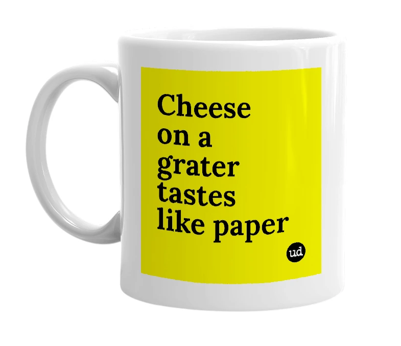 White mug with 'Cheese on a grater tastes like paper' in bold black letters