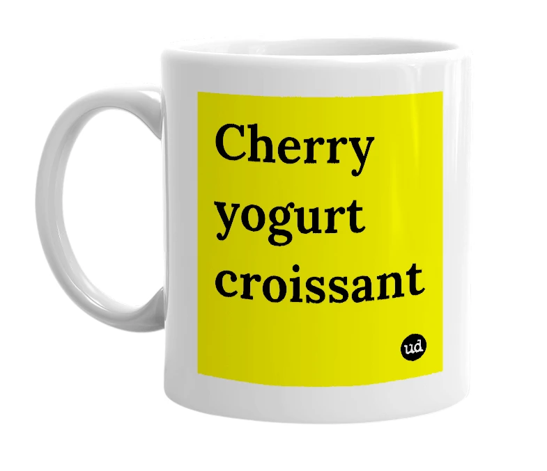 White mug with 'Cherry yogurt croissant' in bold black letters