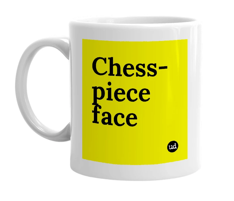 White mug with 'Chess-piece face' in bold black letters
