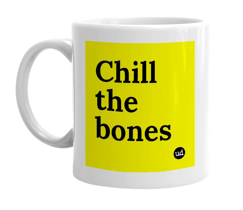 White mug with 'Chill the bones' in bold black letters