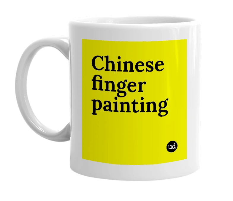 White mug with 'Chinese finger painting' in bold black letters