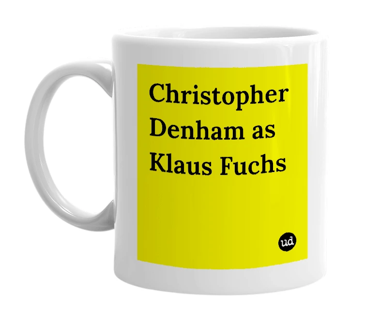 White mug with 'Christopher Denham as Klaus Fuchs' in bold black letters