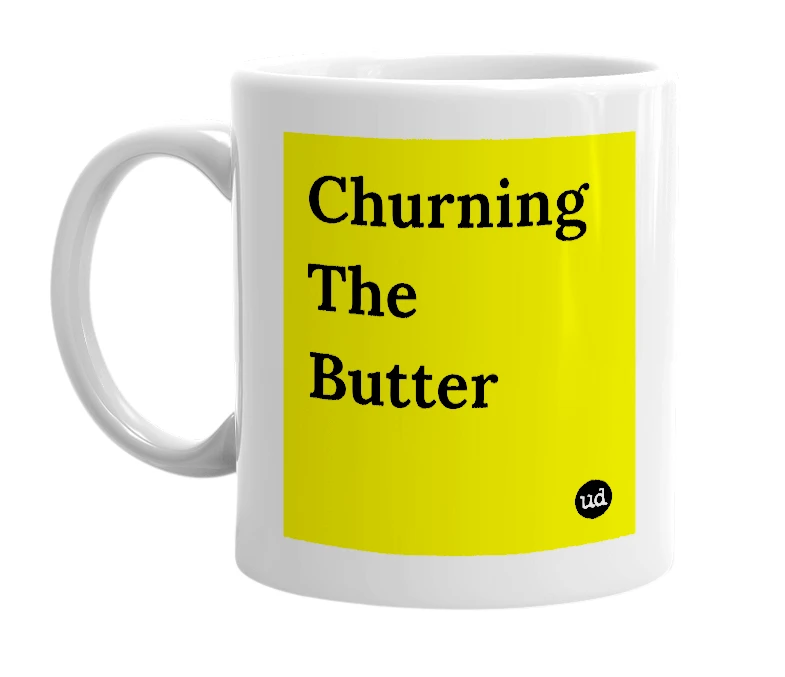 White mug with 'Churning The Butter' in bold black letters