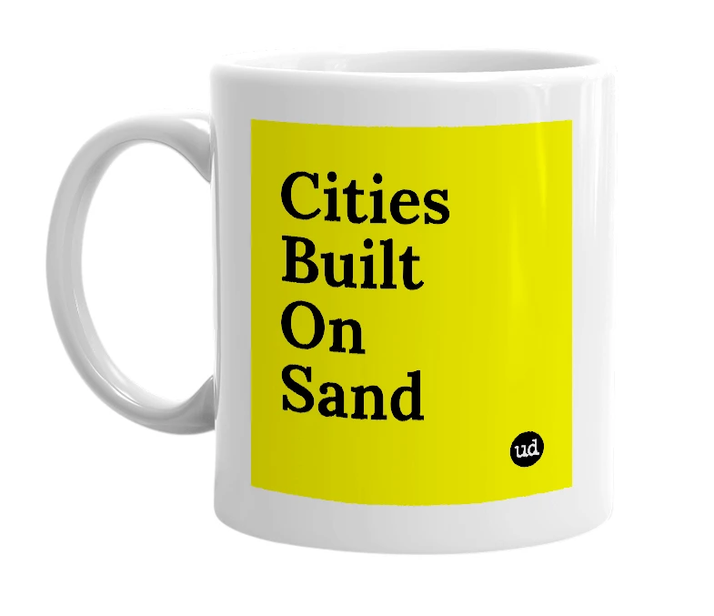 White mug with 'Cities Built On Sand' in bold black letters