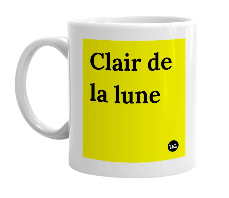 White mug with 'Clair de la lune' in bold black letters