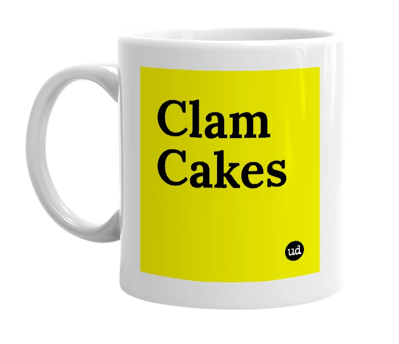 White mug with 'Clam Cakes' in bold black letters