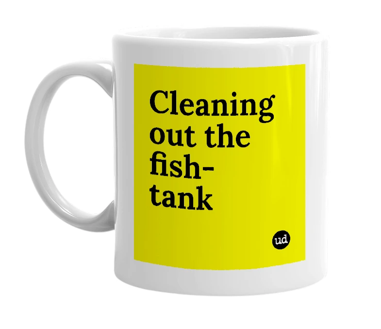 White mug with 'Cleaning out the fish-tank' in bold black letters