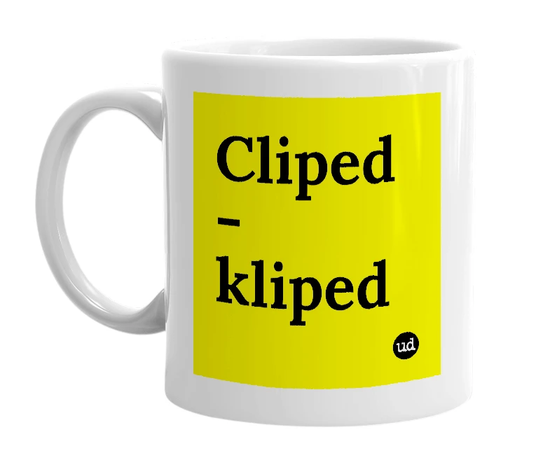White mug with 'Cliped - kliped' in bold black letters