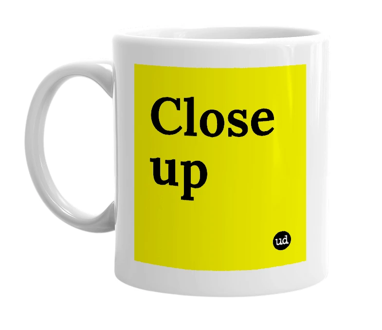 White mug with 'Close up' in bold black letters