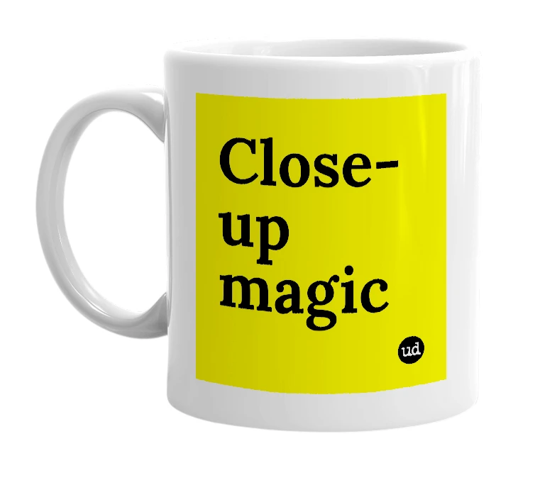 White mug with 'Close-up magic' in bold black letters