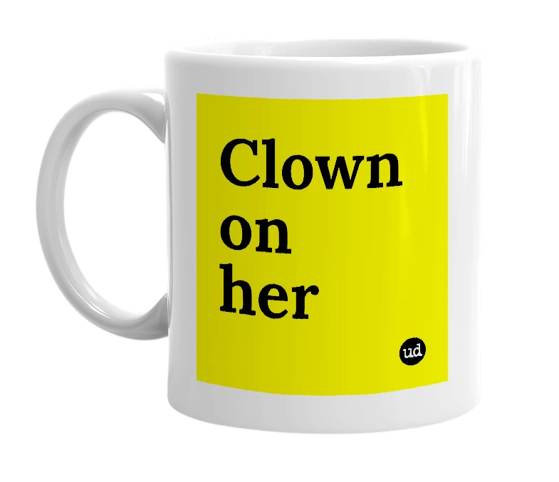 White mug with 'Clown on her' in bold black letters