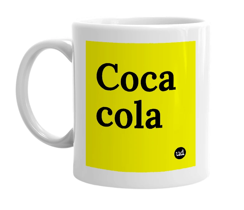 White mug with 'Coca cola' in bold black letters