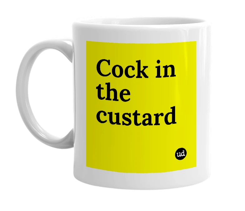 White mug with 'Cock in the custard' in bold black letters