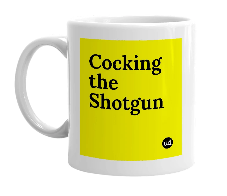 White mug with 'Cocking the Shotgun' in bold black letters