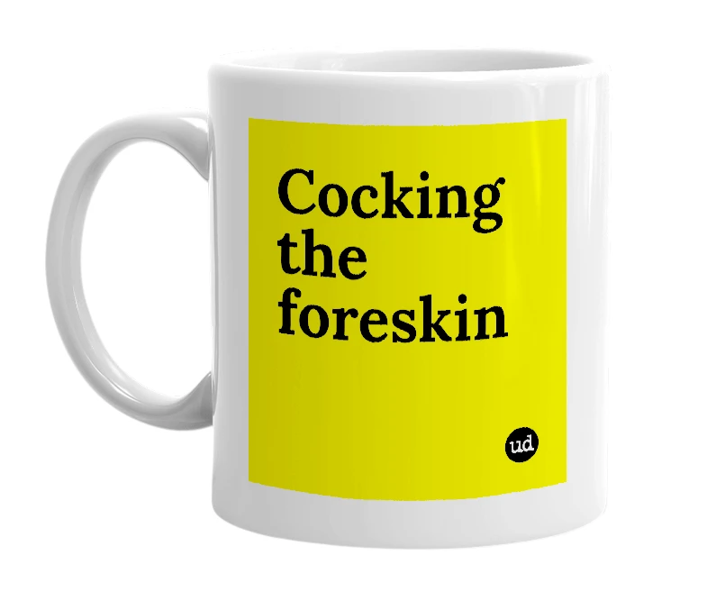 White mug with 'Cocking the foreskin' in bold black letters
