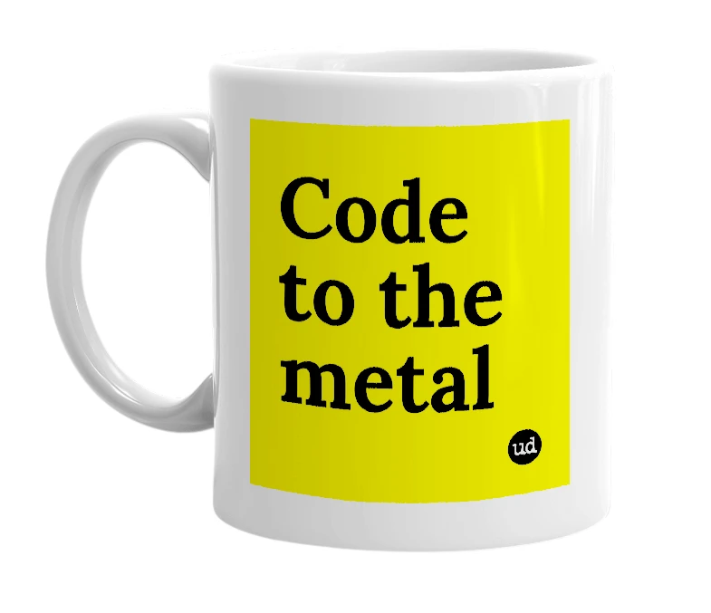 White mug with 'Code to the metal' in bold black letters