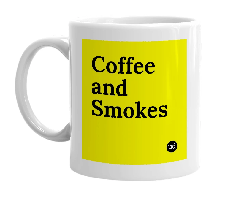 White mug with 'Coffee and Smokes' in bold black letters