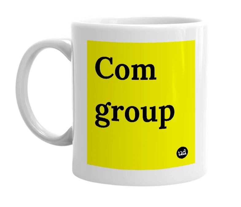White mug with 'Com group' in bold black letters