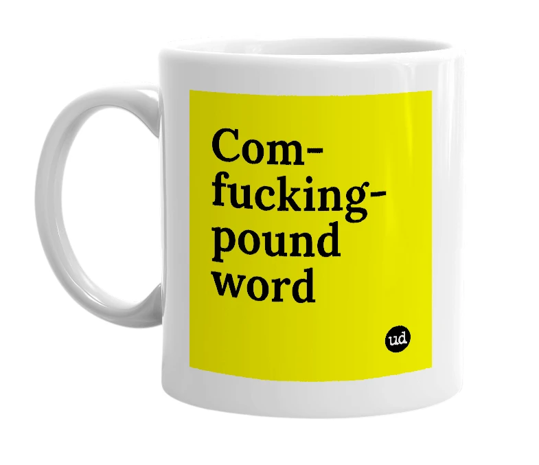 White mug with 'Com-fucking-pound word' in bold black letters