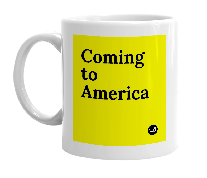 White mug with 'Coming to America' in bold black letters