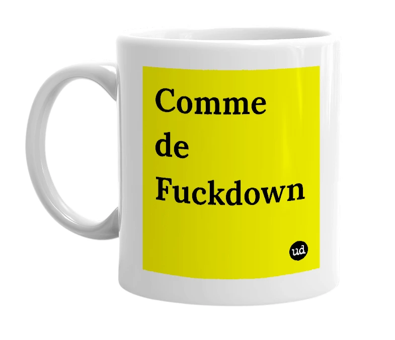 White mug with 'Comme de Fuckdown' in bold black letters