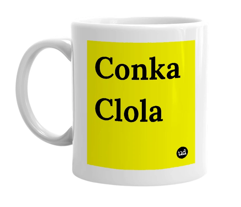 White mug with 'Conka Clola' in bold black letters