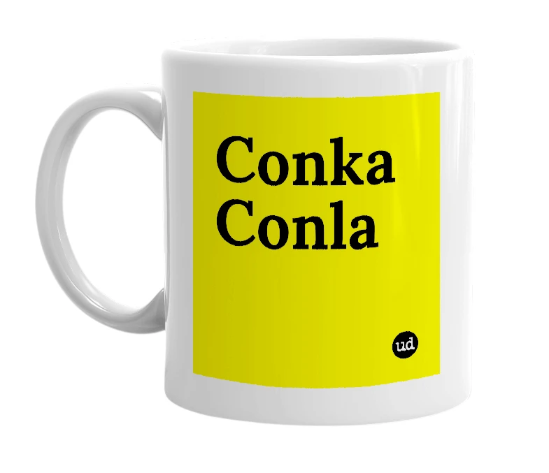 White mug with 'Conka Conla' in bold black letters