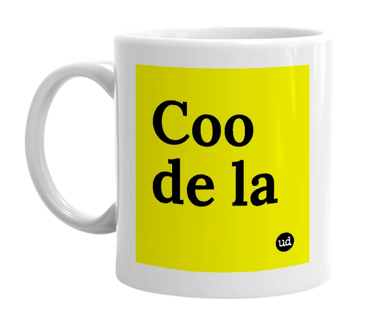 White mug with 'Coo de la' in bold black letters