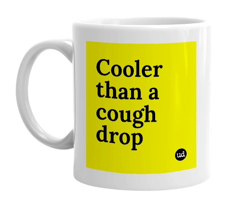 White mug with 'Cooler than a cough drop' in bold black letters